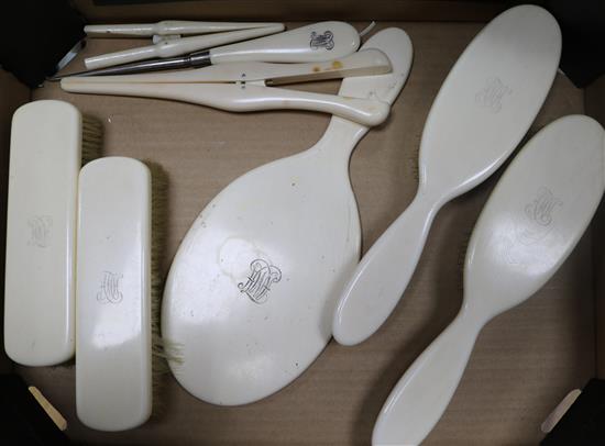 An Edwardian ivory dressing table set